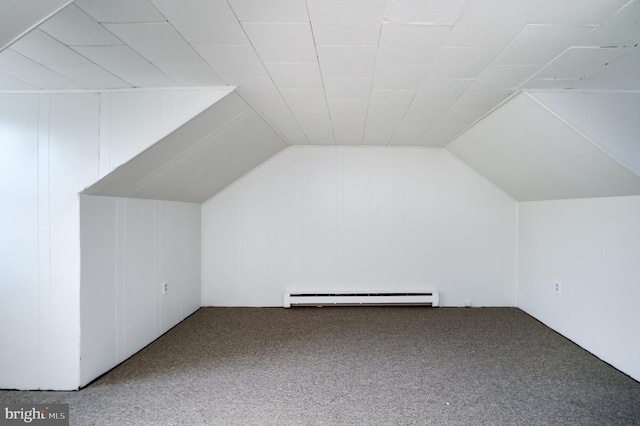 bonus room featuring a baseboard radiator, lofted ceiling, and carpet flooring