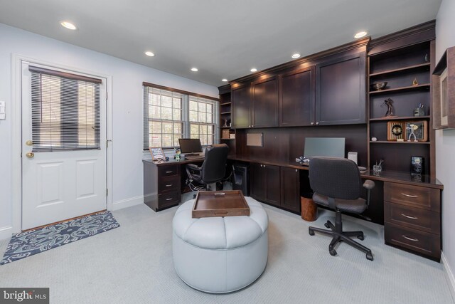 office space with baseboards, recessed lighting, and light carpet