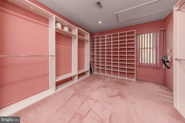 carpeted spare room featuring visible vents and recessed lighting