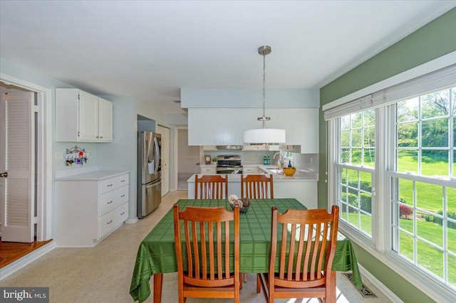 dining room with baseboards