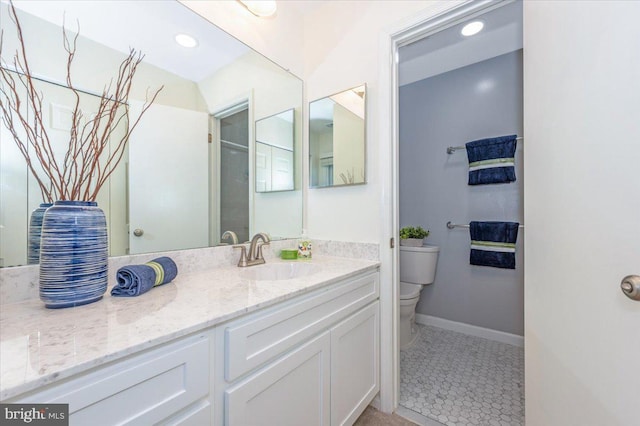 bathroom with recessed lighting, tile patterned floors, toilet, vanity, and baseboards