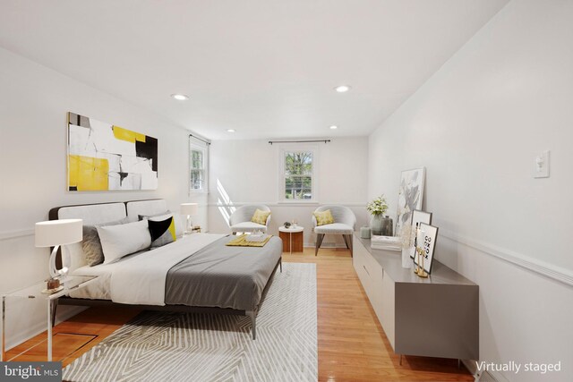 bedroom featuring recessed lighting and light wood finished floors