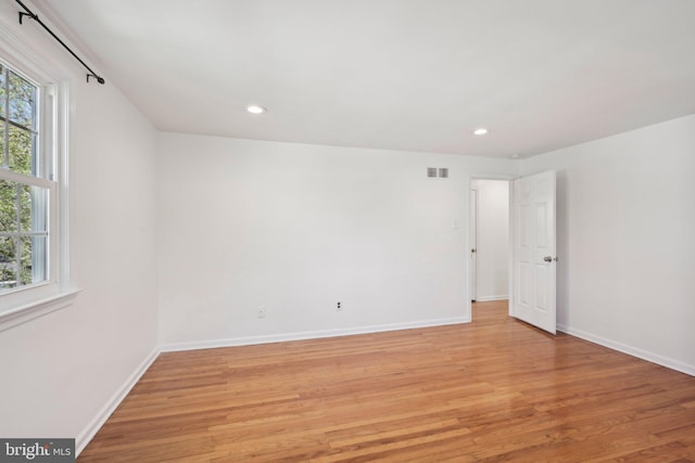 interior space featuring recessed lighting, baseboards, and light wood-type flooring