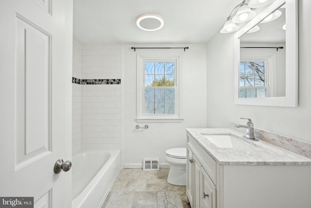 full bathroom with toilet, visible vents, vanity, and baseboards