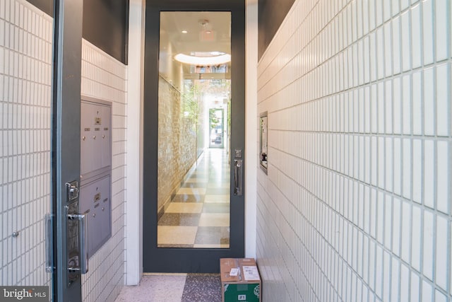 property entrance featuring elevator