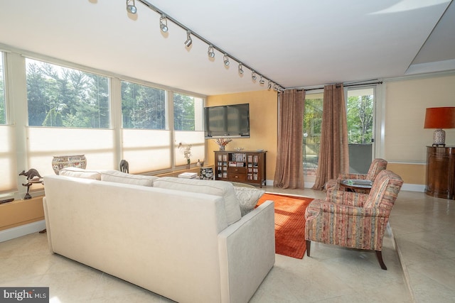 living room featuring baseboards