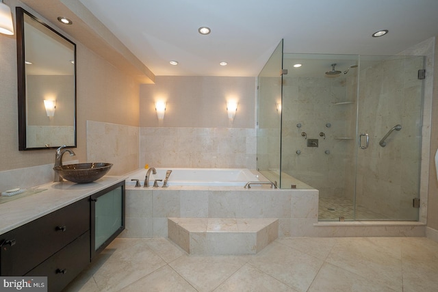 full bathroom with a bath, a shower stall, vanity, tile patterned floors, and recessed lighting