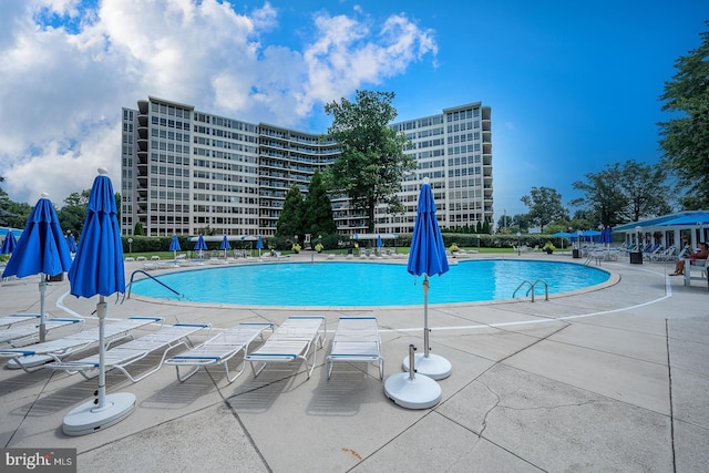 community pool with a patio