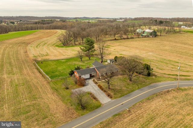 birds eye view of property featuring a rural view