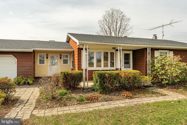 ranch-style home with an attached garage