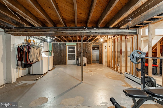 unfinished basement with washing machine and dryer