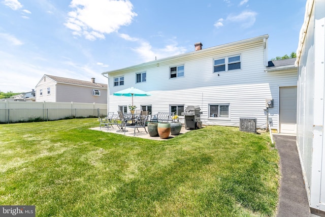 228 Purdue Ave, Pemberton, NJ 08068 - rear view of house featuring a patio, a chimney, and central AC