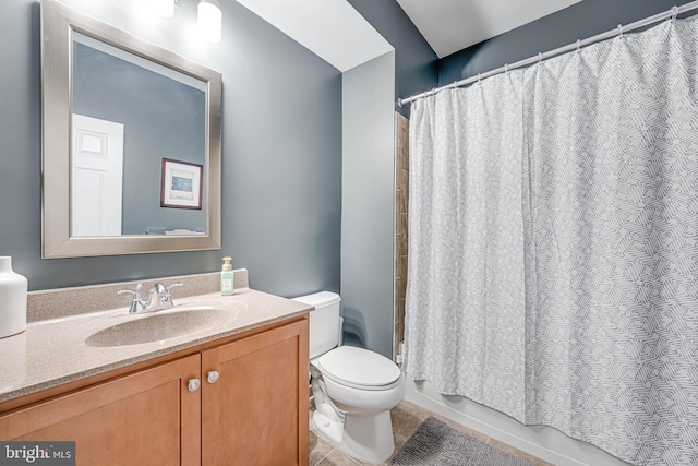 42880 Conrad Ter, Chantilly, VA 20152 - bathroom featuring toilet, tile patterned floors, shower / bath combo, and vanity