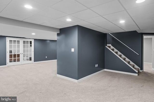finished below grade area featuring recessed lighting, carpet flooring, and baseboards