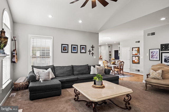 living room featuring visible vents, a ceiling fan, and recessed lighting