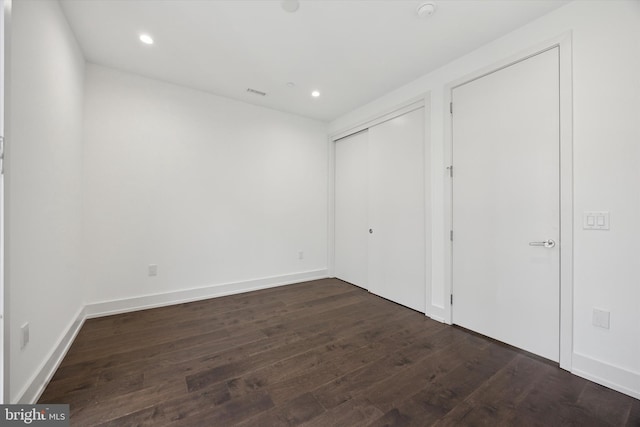 602 N 5th St Unit 5, Philadelphia, PA 19123 - unfurnished bedroom with recessed lighting, a closet, visible vents, and dark wood-style flooring