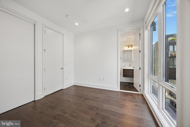 602 N 5th St Unit 5, Philadelphia, PA 19123 - unfurnished bedroom with ensuite bath, baseboards, recessed lighting, and dark wood finished floors