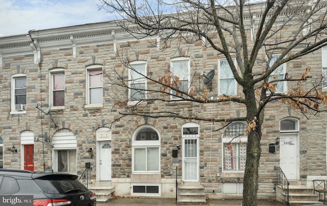 3420 E Baltimore St, Baltimore, MD 21224 - view of property featuring entry steps and stone siding