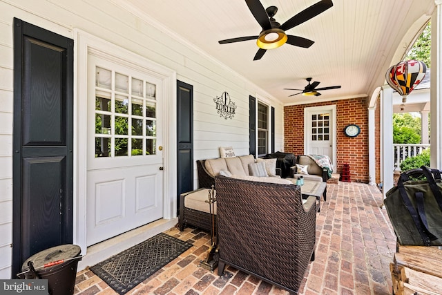 view of patio / terrace featuring covered porch, ceiling fan, and an outdoor hangout area