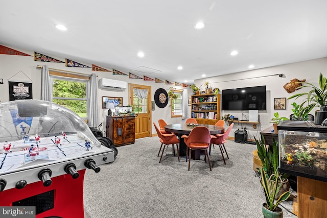 recreation room featuring a wall mounted AC, carpet flooring, and recessed lighting