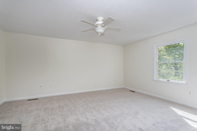 275 Wood Rise Ln, Winchester, VA 22602 - unfurnished room with visible vents, ceiling fan, and light carpet