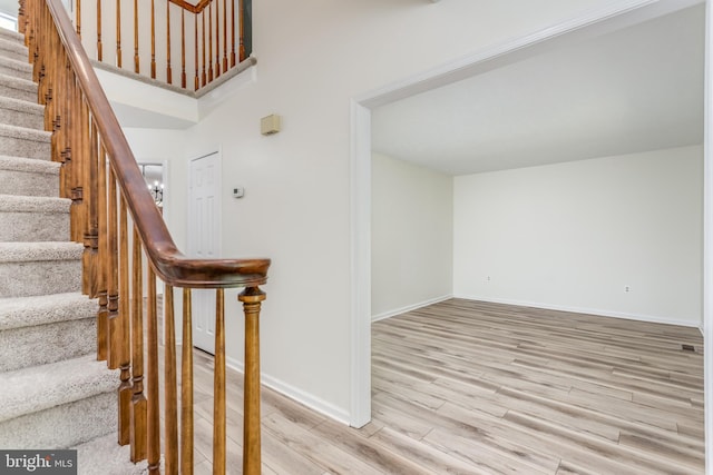 275 Wood Rise Ln, Winchester, VA 22602 - stairs with baseboards and wood finished floors