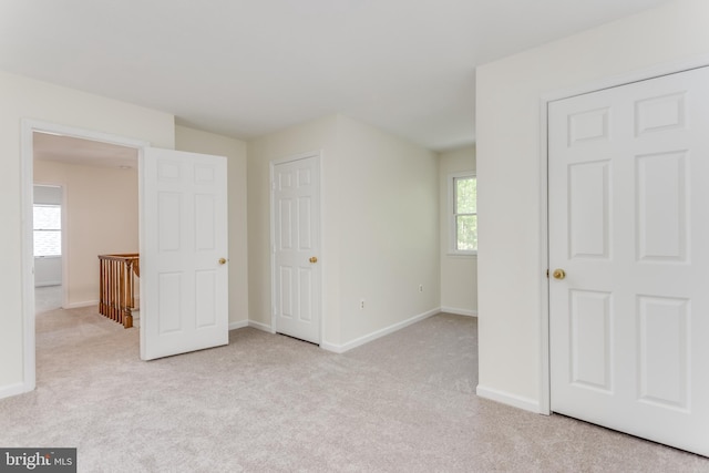 275 Wood Rise Ln, Winchester, VA 22602 - unfurnished bedroom with baseboards and light colored carpet