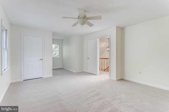 275 Wood Rise Ln, Winchester, VA 22602 - unfurnished bedroom featuring a ceiling fan, baseboards, and light carpet