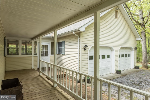275 Wood Rise Ln, Winchester, VA 22602 - wooden deck with driveway and a garage