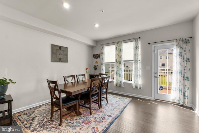 dining room with baseboards, recessed lighting, and wood finished floors