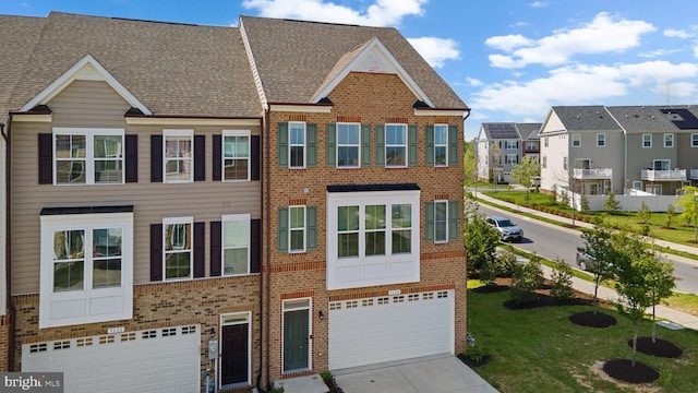 townhome / multi-family property featuring brick siding, a garage, a residential view, and concrete driveway