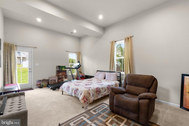 bedroom featuring baseboards, multiple windows, carpet flooring, and recessed lighting