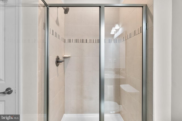 bathroom featuring a stall shower