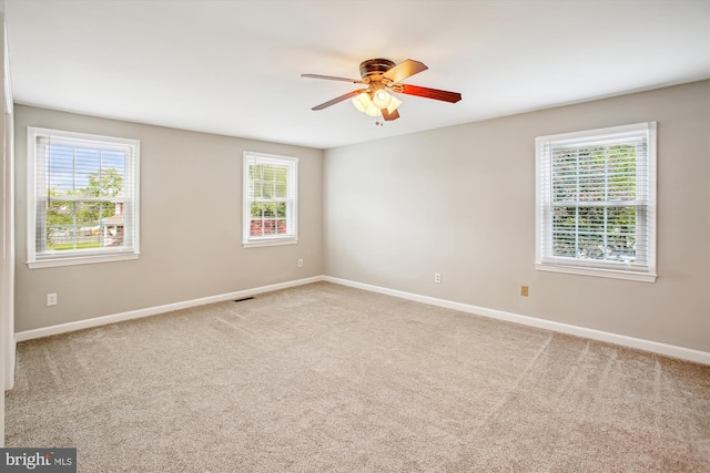 21130 Haystack Ct, Ashburn, VA 20147 - carpeted spare room featuring baseboards and a ceiling fan