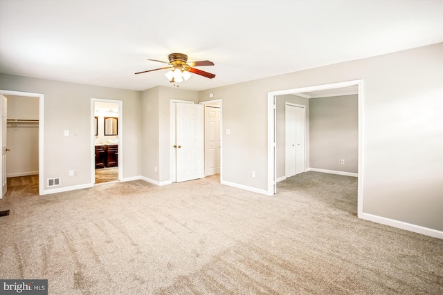 21130 Haystack Ct, Ashburn, VA 20147 - unfurnished bedroom with carpet floors, baseboards, a walk in closet, and ensuite bath