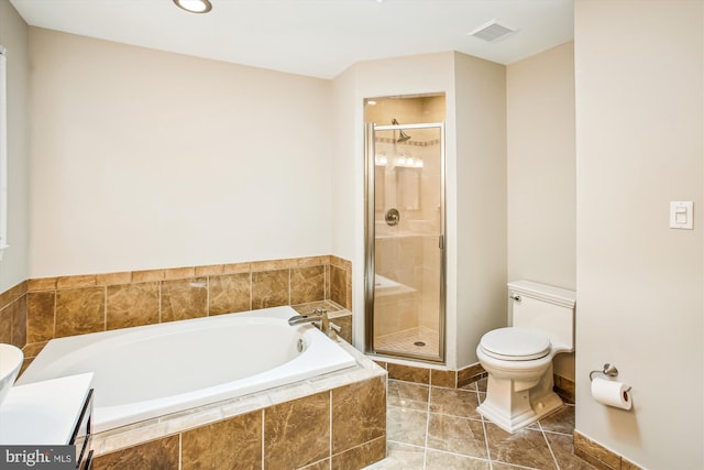 21130 Haystack Ct, Ashburn, VA 20147 - full bathroom featuring toilet, a garden tub, a shower stall, tile patterned floors, and vanity