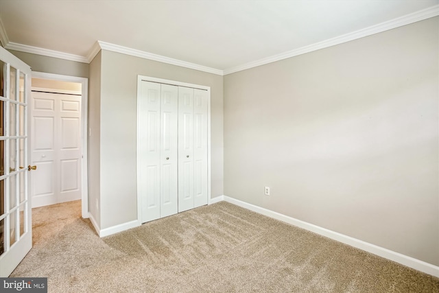 21130 Haystack Ct, Ashburn, VA 20147 - unfurnished bedroom featuring carpet, baseboards, crown molding, and a closet