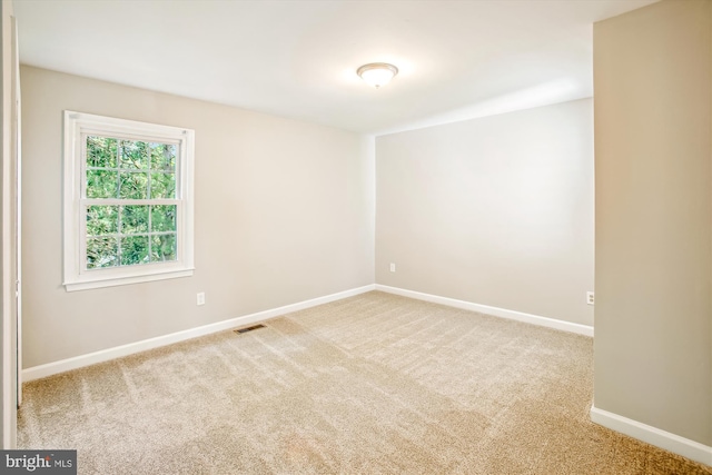 21130 Haystack Ct, Ashburn, VA 20147 - carpeted empty room with baseboards