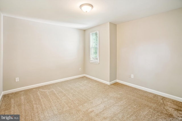 21130 Haystack Ct, Ashburn, VA 20147 - carpeted empty room with baseboards