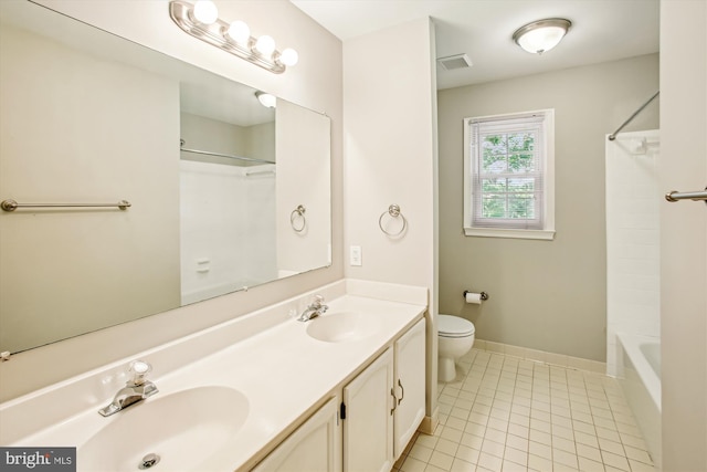 21130 Haystack Ct, Ashburn, VA 20147 - bathroom featuring double vanity, toilet, tile patterned flooring, shower / bath combination, and baseboards