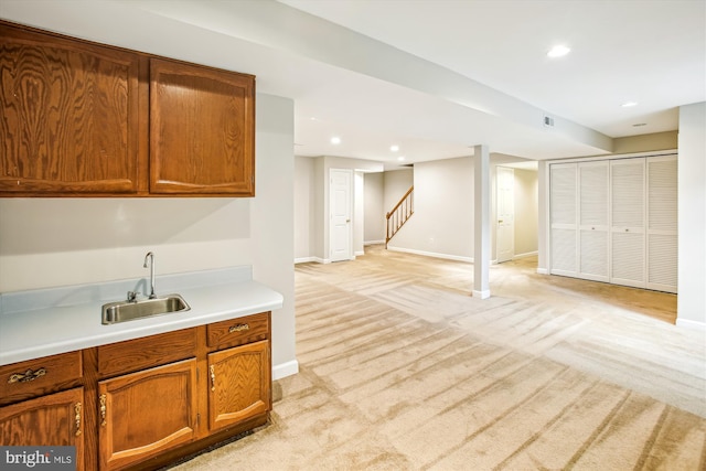 21130 Haystack Ct, Ashburn, VA 20147 - bar with a sink, baseboards, light colored carpet, recessed lighting, and stairs