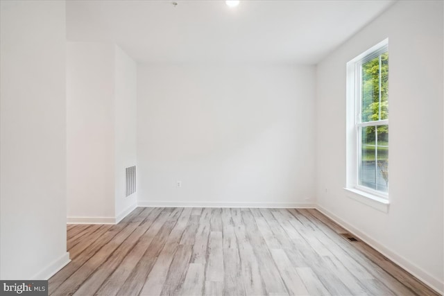 9842 Fire Tower Rd, Ijamsville, MD 21754 - empty room with wood finished floors and baseboards
