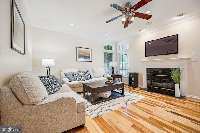 502 Leaning Oak St, Gaithersburg, MD 20878 - living area with ornamental molding, ceiling fan, wood finished floors, a fireplace with flush hearth, and recessed lighting