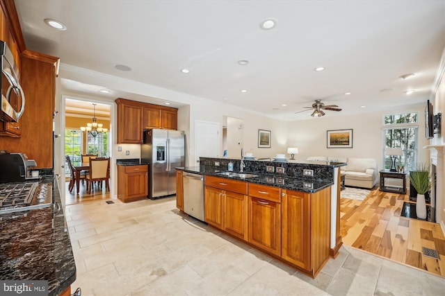 502 Leaning Oak St, Gaithersburg, MD 20878 - kitchen with a sink, appliances with stainless steel finishes, a chandelier, plenty of natural light, and recessed lighting