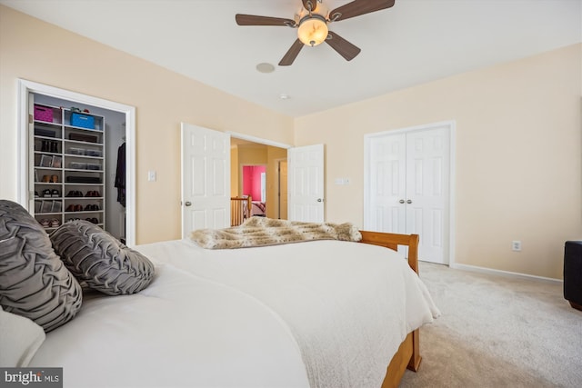 502 Leaning Oak St, Gaithersburg, MD 20878 - bedroom with a closet, light carpet, a ceiling fan, and baseboards