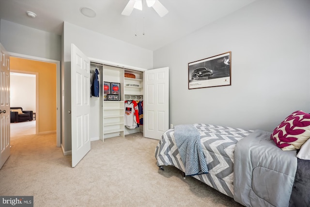 502 Leaning Oak St, Gaithersburg, MD 20878 - bedroom with light carpet, a closet, ceiling fan, and baseboards