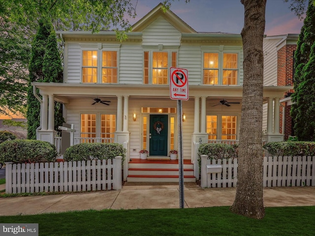 502 Leaning Oak St, Gaithersburg, MD 20878 - view of front of property featuring a ceiling fan, a porch, and fence