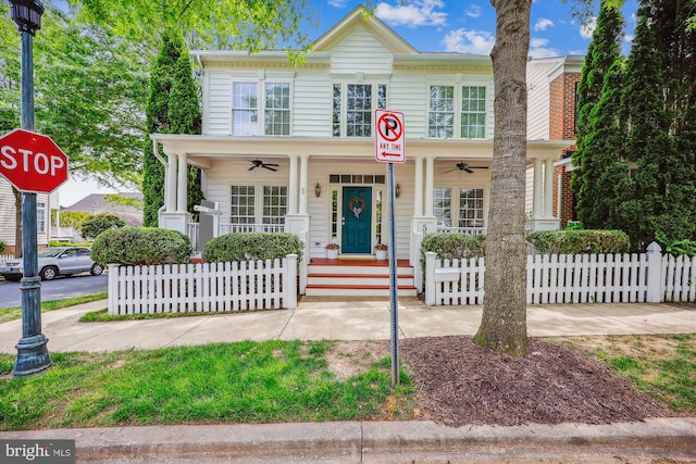 502 Leaning Oak St, Gaithersburg, MD 20878 - view of front of home with ceiling fan, a porch, and a fenced front yard