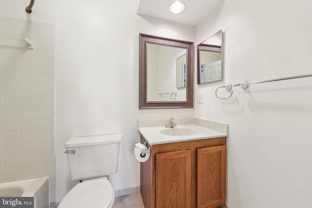 bathroom featuring toilet and vanity