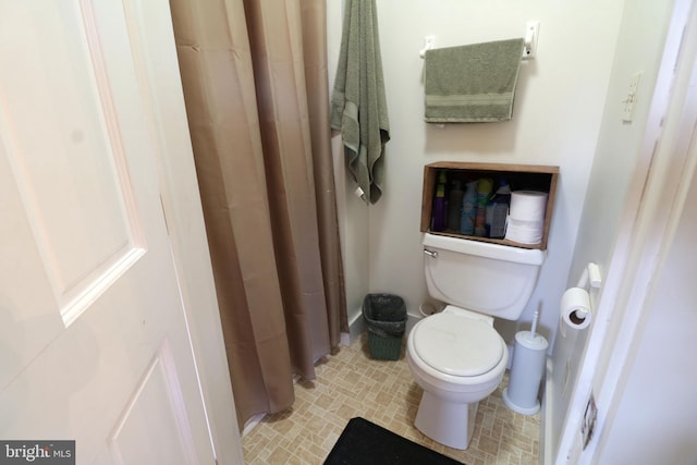 268 Geary Rd, Centre Hall, PA 16828 - bathroom with a shower with shower curtain and toilet
